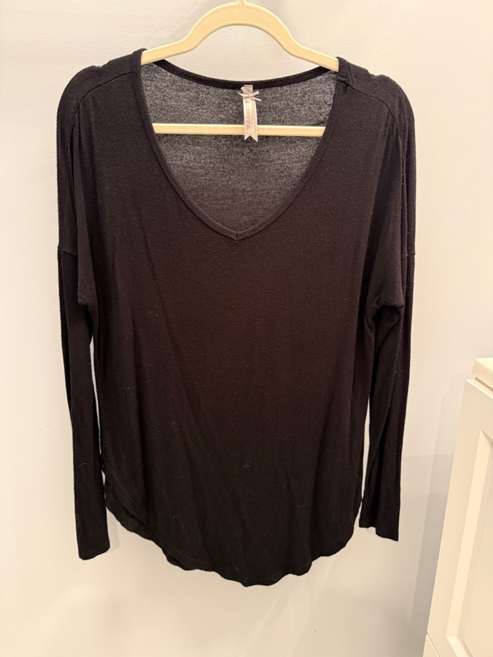Women's Black V-Neck Long Sleeve Tee by (unknown)